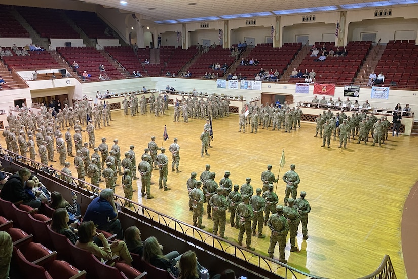 Soldiers with 2nd Battalion, 112th Infantry Regiment, 56th Stryker Brigade Combat Team, 28th Infantry Division and their families are recognized during a ceremony at the Zembo Shrine Auditorium in Harrisburg, Pennsylvania, Dec. 17, 2023. The Soldiers will leave their homes and families for about a year as they deploy to the Horn of Africa, supporting U.S. Africa Command and partner forces with security objectives in the region. During the ceremony, Gov. Josh Shapiro, Maj. Gen. Mark Schindler, Col. Christopher Costello and Lt. Col. Eric Ponzek shared remarks. (U.S. Army National Guard photo by Maj. Travis Mueller)