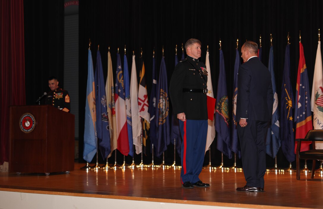 U.S. Marine Corps Col. Donald Wright, chief of staff of Marine Corps Base Quantico, a native of Universal City, Texas, left, stands facing retired Lt. Gen. David Furness during his retirement ceremony on MCBQ, Virginia, Dec. 15, 2023. Wright retired as chief of staff for the base after 30 years of honorable service, a career including tours of Iraq, Afghanistan, and Indonesia. (U.S. Marine Corps photo by Lance Cpl. David Brandes)