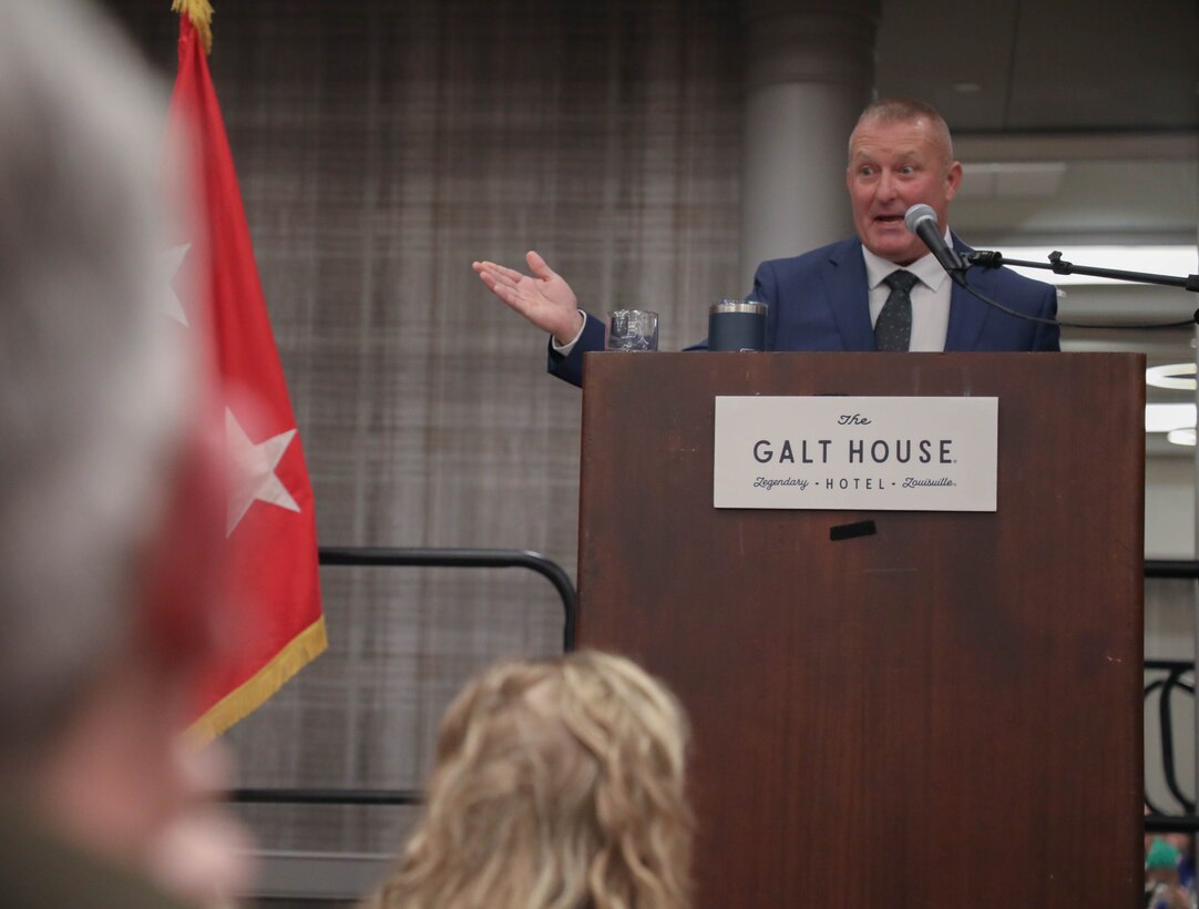 Retired Command Sgt. Maj. Johnnie Parton speaks to the audience of Soldiers and their guests as part of the events last words during the Mission Maker award ceremony held at the Galt House hotel Dec. 16, 2023.