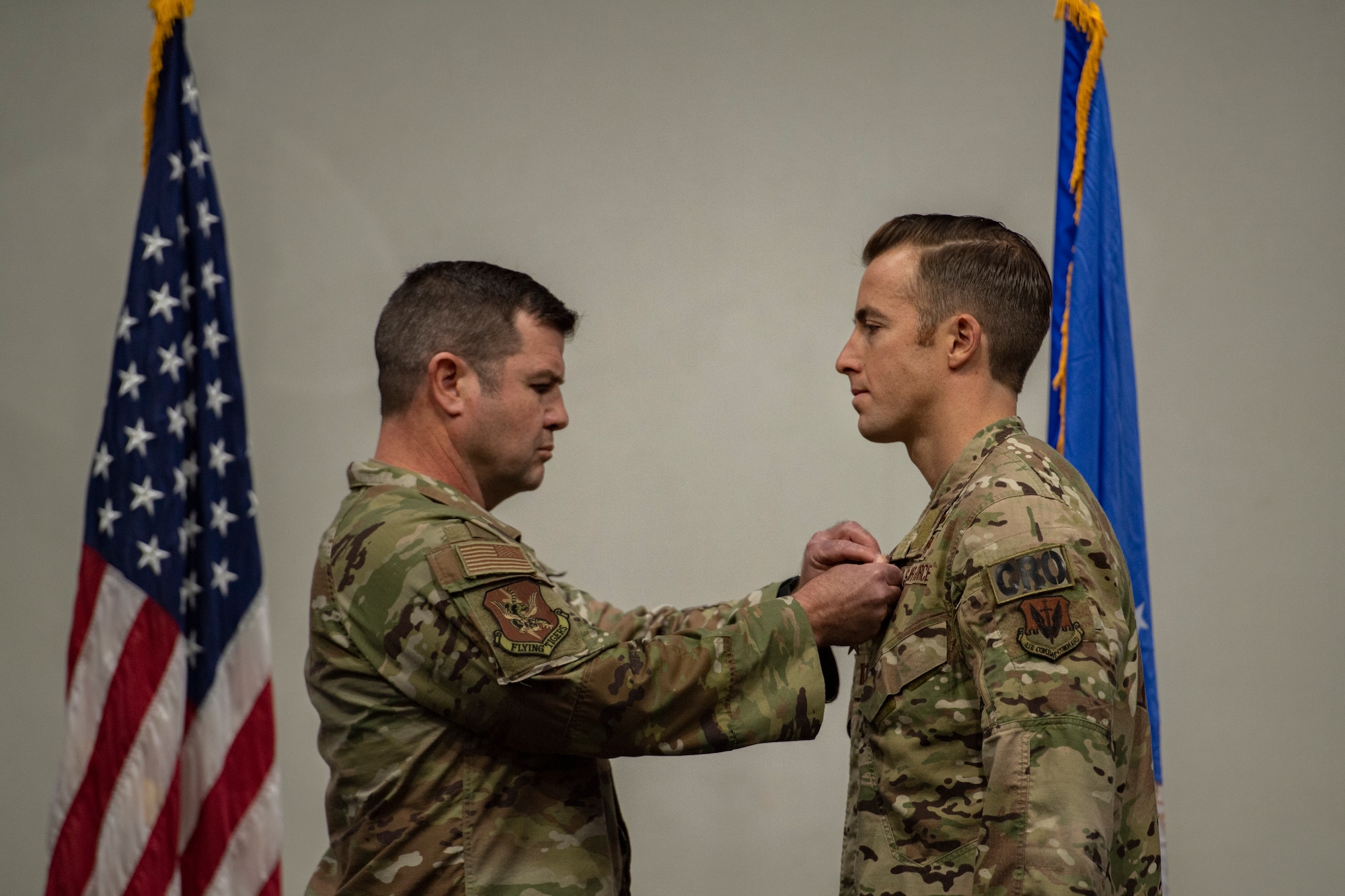 Base commander pins bronze star recipient