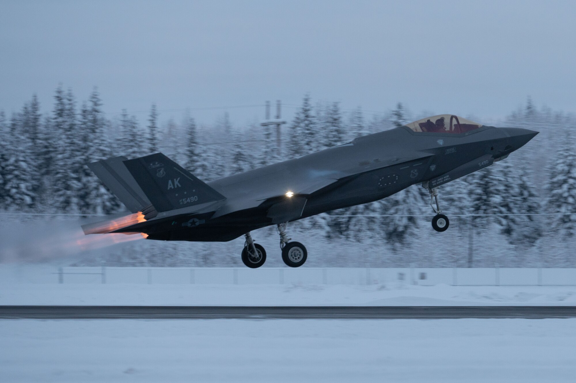 An F-35A Lightning II takes off for routine training on Eielson Air Force Base, Alaska, Dec. 18, 2023.