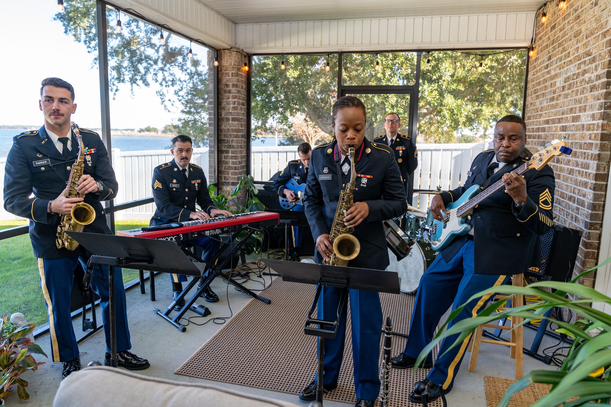 Members of the U.S. Army National Guard band play during the joint Holiday Social at Keesler Air Force Base, Mississippi, Dec. 17, 2023.