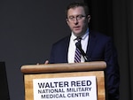 Matthew Wilkerson, Ph.D., associate professor, Department of Anatomy, Physiology, and Genetics, and Data Science core director at the Center for Military Precision Health at USU, discusses the novel discoveries of lung adenocarcinoma during the annual Murtha Cancer Center's Lung Cancer Summit, held Dec. 12 at Walter Reed.