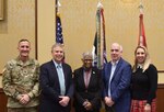 Womack Army Medical Center Commander Col. David Zinnante, Billy West, Cumberland County district attorney, Dr. Sharon Cooper, developmental and forensic pediatrician, Dr. Michael Bourke, clinical and forensic psychologist, and Kelly Taylor, forensic healthcare program manager, pose for a picture after speaking during the 7th Annual Special Victims Summit, Dec 6 at the Iron Mike Conference Center, Fort Liberty.