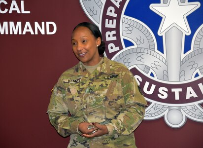 Staff Sgt. Chantele Kemp speaks after receiving the Fort Detrick UPL Challenge quarterly award Dec. 5, 2023, at Army Medical Logistics Command headquarters at Fort Detrick, Maryland. (C.J. Lovelace)