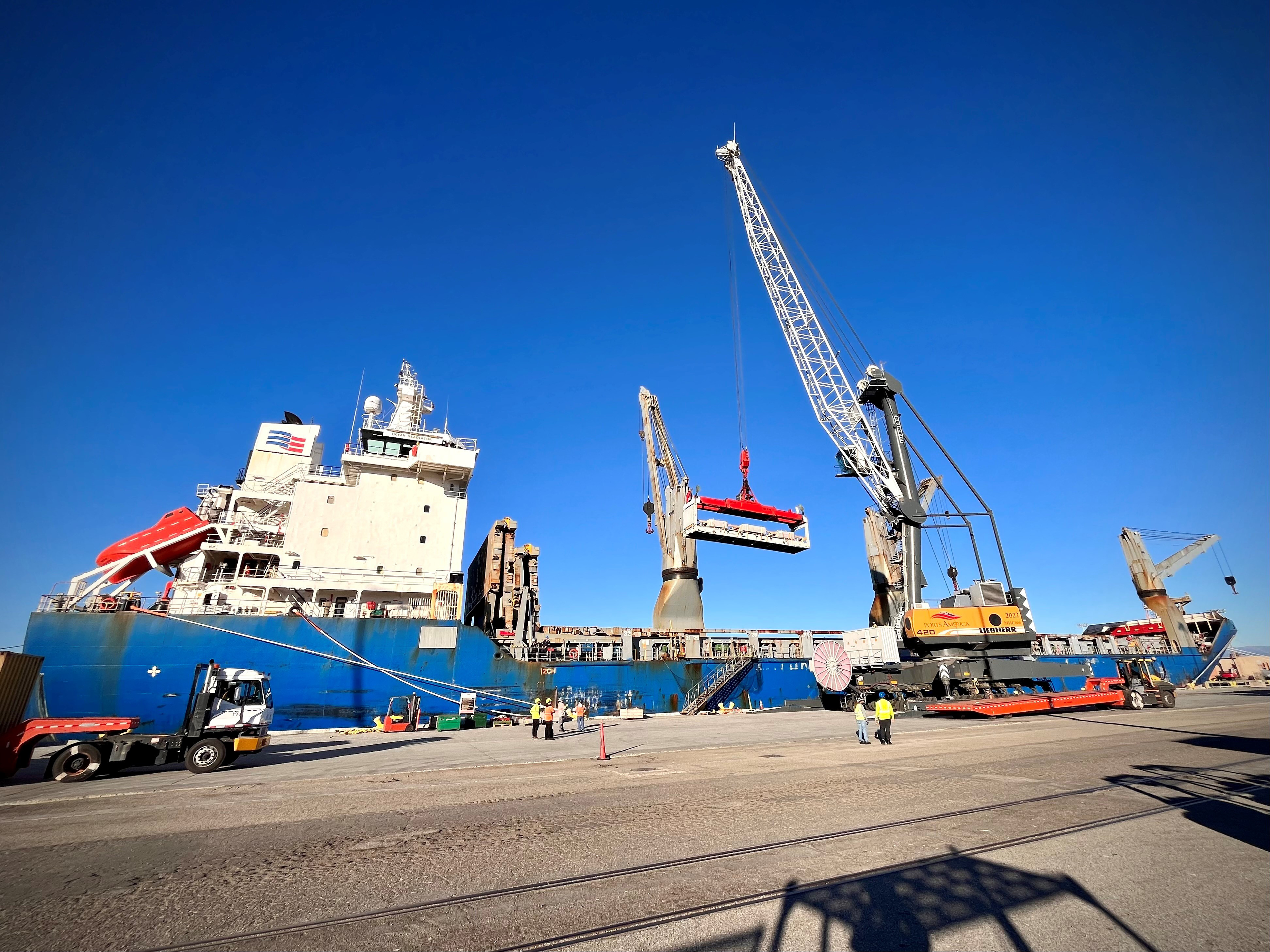 Precast concrete foundations are loaded onto the Military Sealift Command chartered ship MV Ocean Gladiator as part of the Operation Deep Freeze 2024 cargo loadout.  Cargo operations are being coordinated by MSC's Expeditionary Port Unit 114 in Port Hueneme Calif.