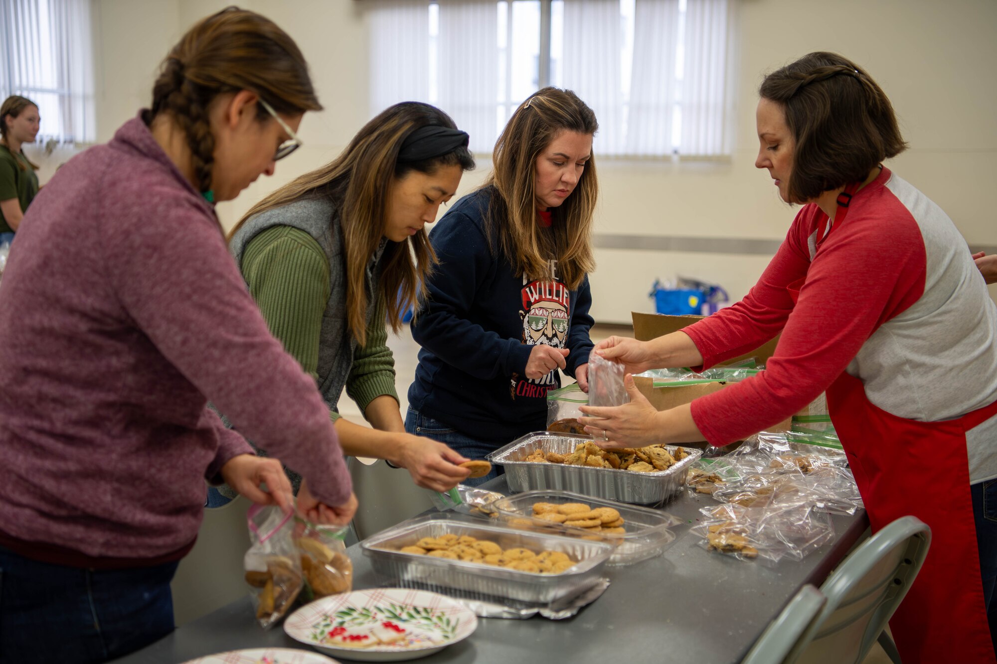 Volunteers bag cookies for the annual Yokota Cookie Crunch at the main chapel on Yokota Air Base, Japan.