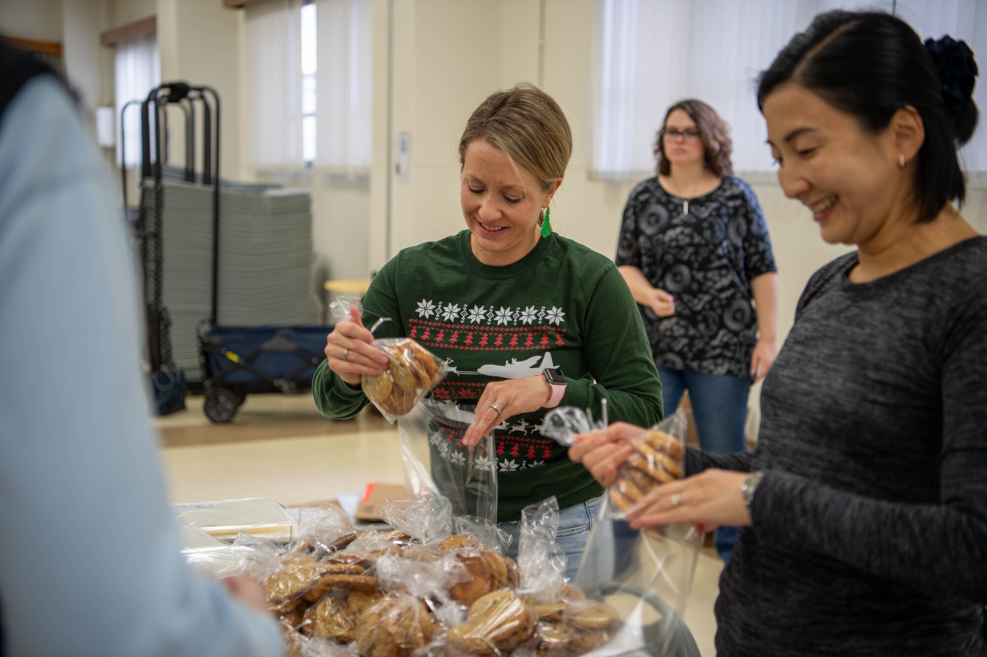 Volunteers bag cookies for the annual Yokota Cookie Crunch at the main chapel on Yokota Air Base, Japan.
