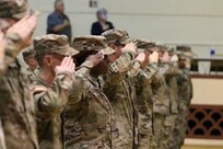 Soldiers with 2nd Battalion, 112th Infantry Regiment, 56th Stryker Brigade Combat Team, 28th Infantry Division and their families are recognized during a ceremony at the Zembo Shrine Auditorium in Harrisburg, Pennsylvania, Dec. 17, 2023. The Soldiers will leave their homes and families for about a year as they deploy to the Horn of Africa, supporting U.S. Africa Command and partner forces with security objectives in the region. During the ceremony, Gov. Josh Shapiro, Maj. Gen. Mark Schindler, Col. Christopher Costello and Lt. Col. Eric Ponzek shared remarks. (U.S. Army National Guard photo by Maj. Travis Mueller)
