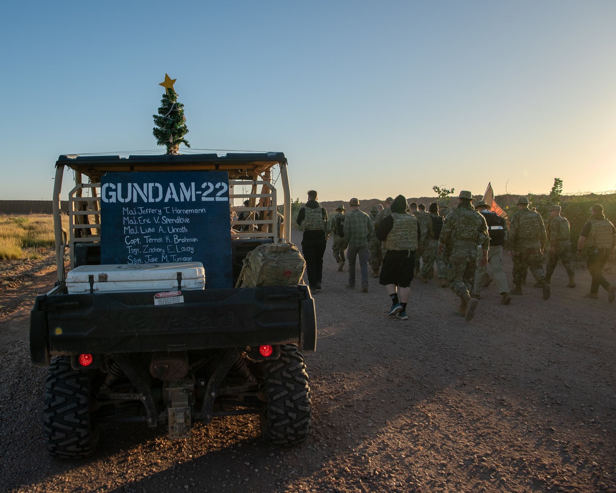 U.S. Airmen participate in memorial ruck march.