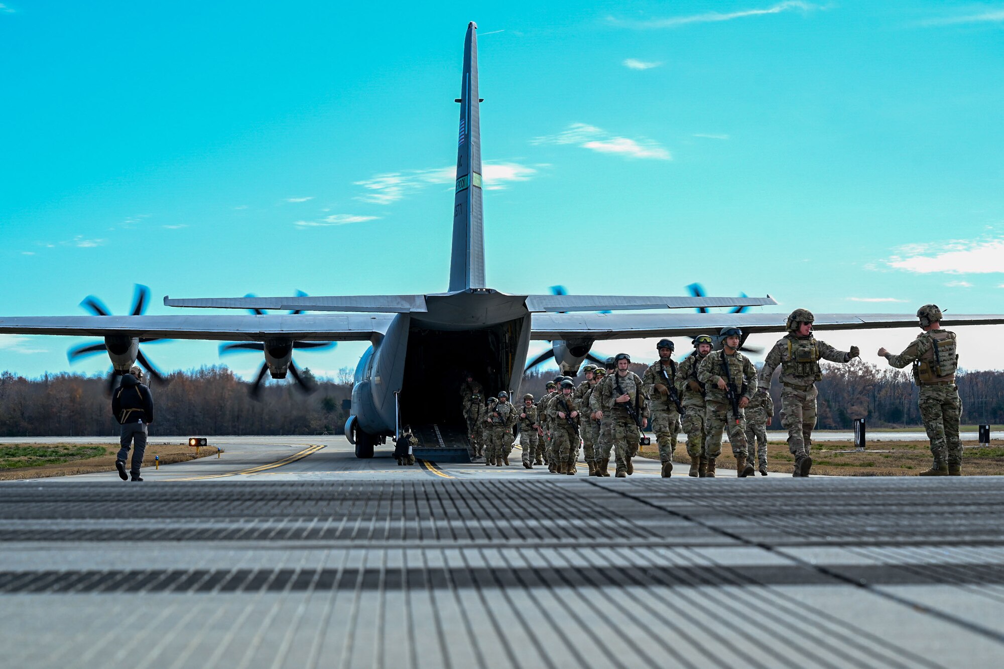 Team Little Rock Airmen depart from a C-130J Super Hercules during a Warrior Airmen Readiness Center capstone event