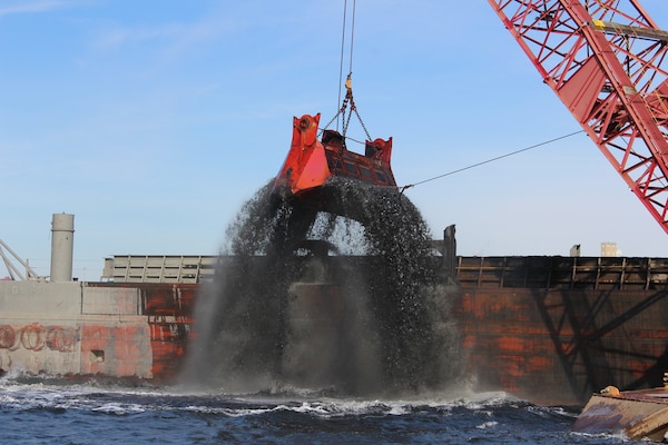 All dredged material from the Baltimore Harbor and Channels will be removed via clamshell dredge and transported by barge to the respective placement sites. The material being removed consists primarily of mud, silt, sand, shell, and mixtures thereof.