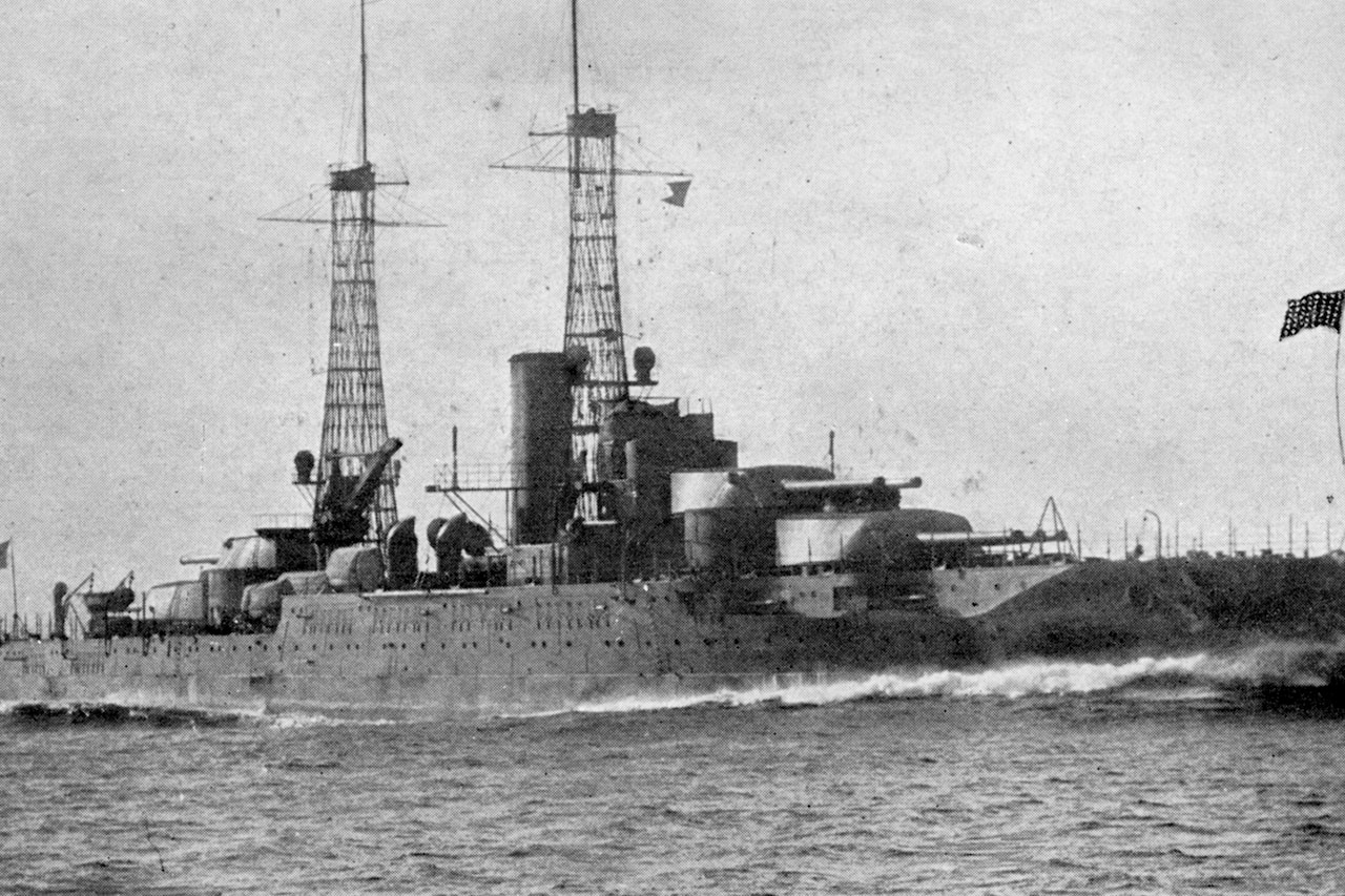 A ship floats in the ocean.