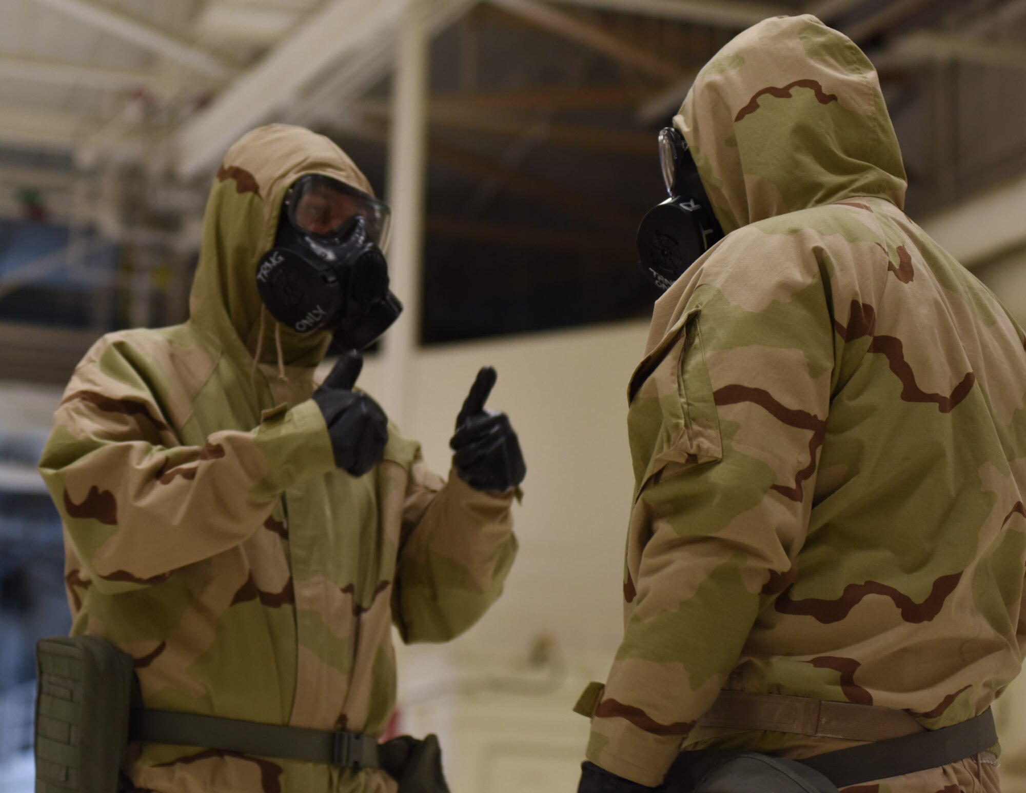 Airmen take the CBRN training course.