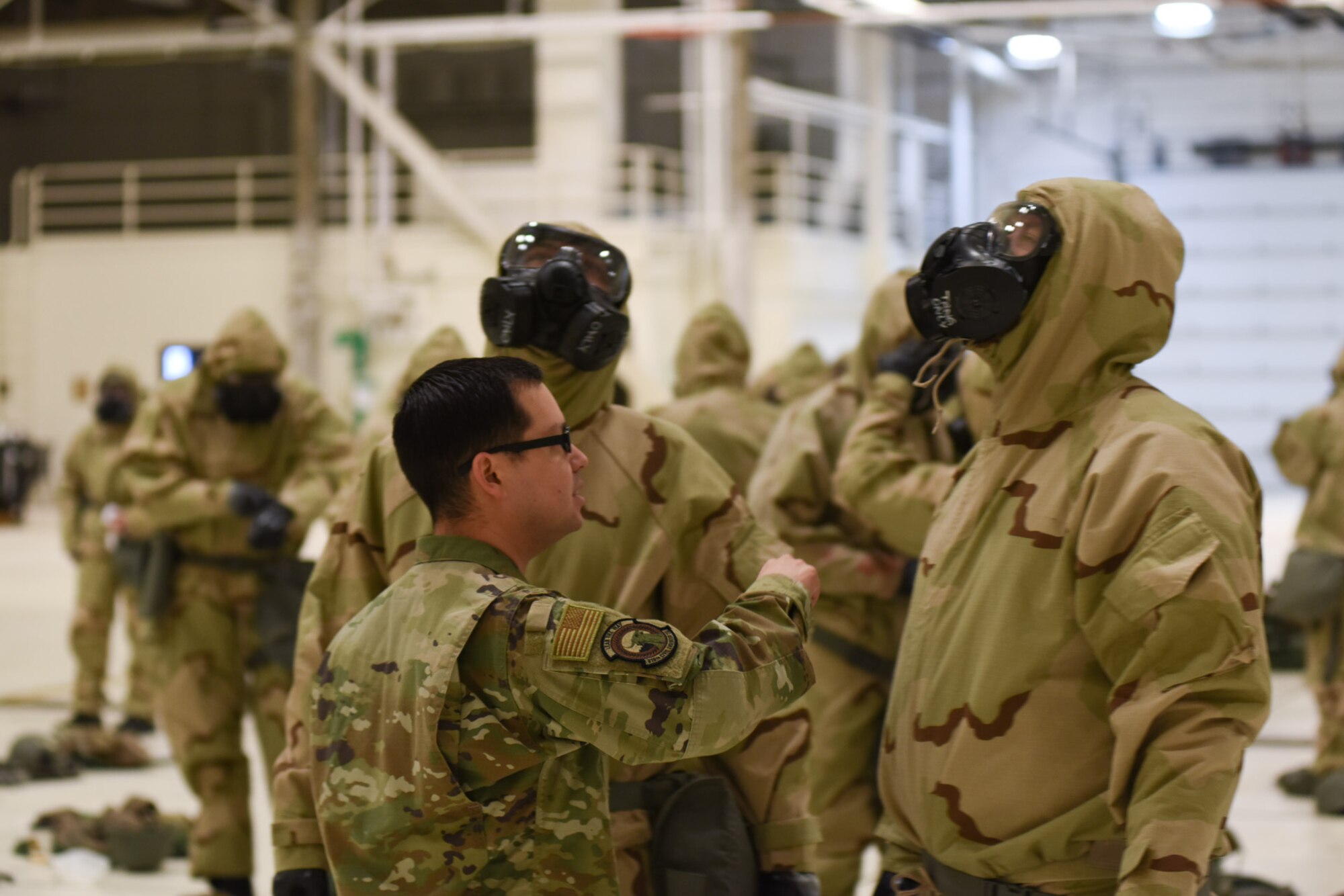 Airmen take the CBRN training course.