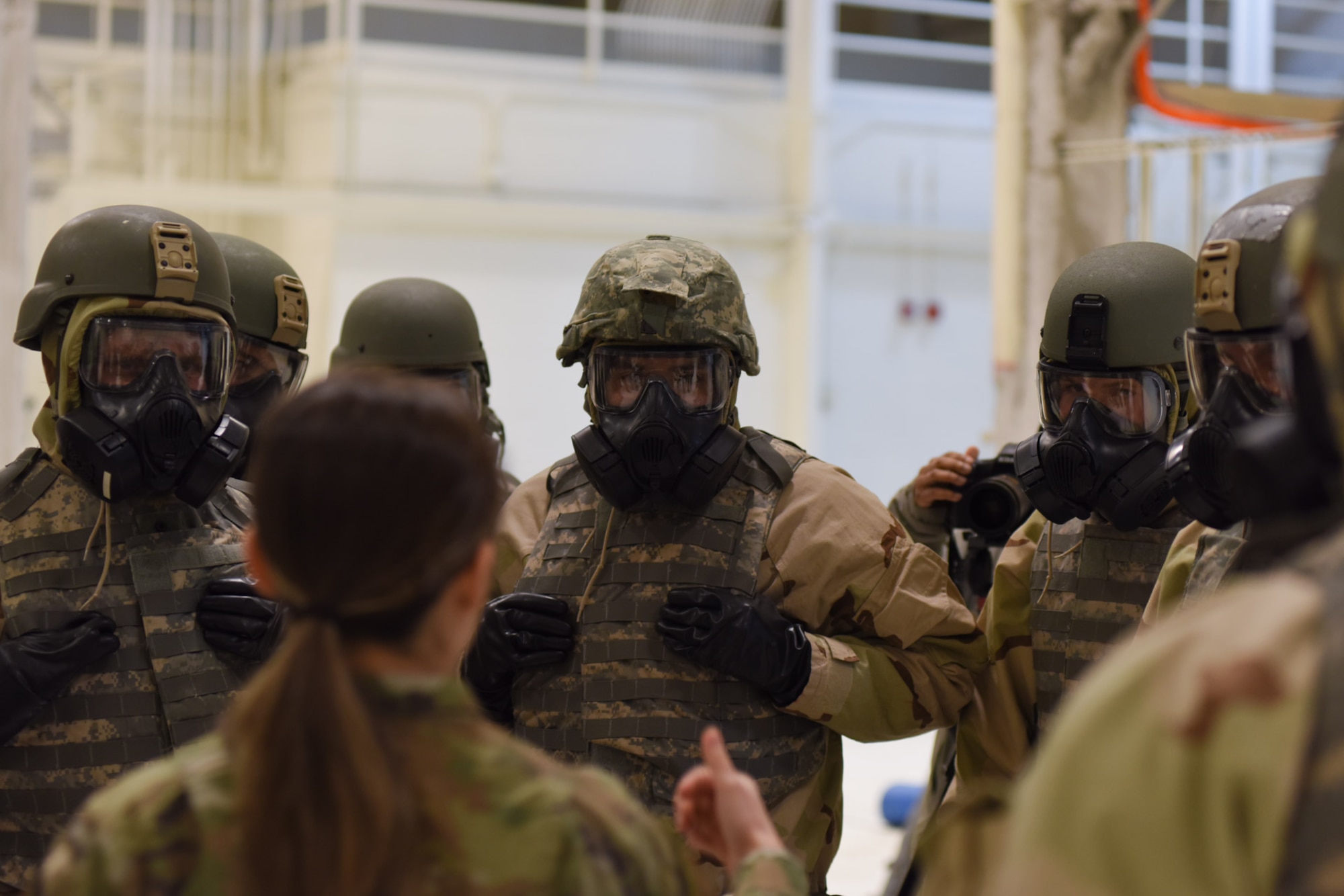 Airmen take the CBRN training course.