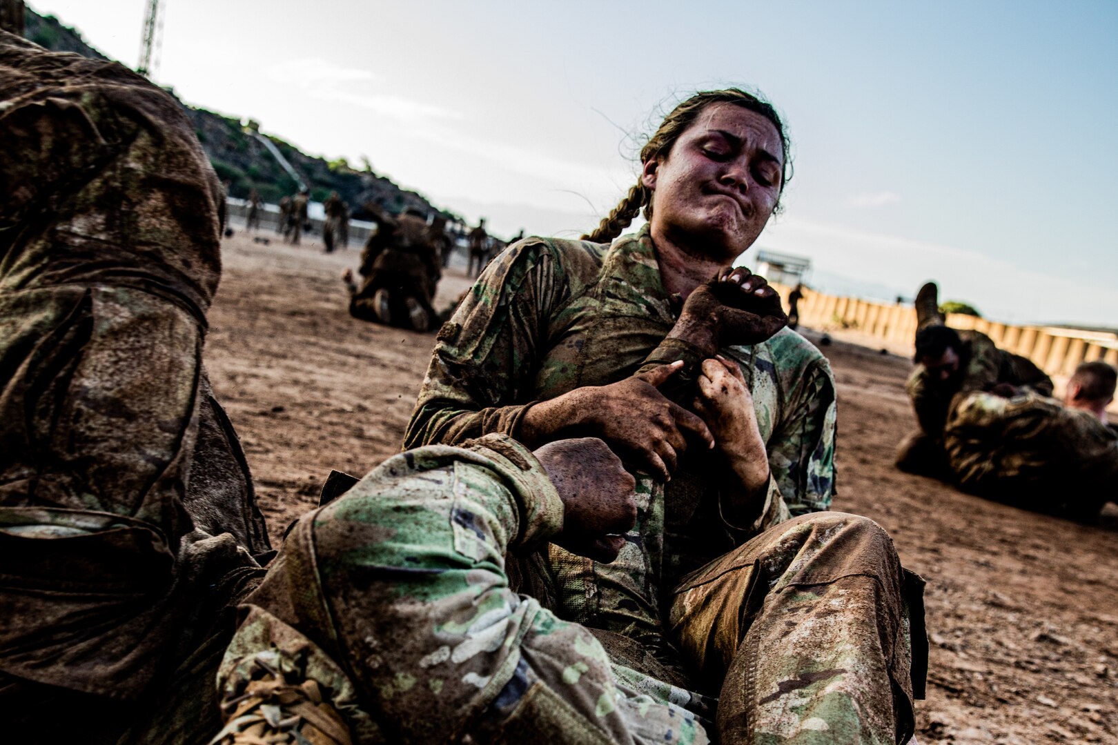 U.S. Army Sgt. Liliana Munday, a Soldier with 218th Maneuver Enhancement Brigade, South Carolina National Guard, Combined Joint Task Force - Horn of Africa, practices grappling techniques with another Soldier as a part of combative training during the French Desert Commando Course Nov. 29, 2023, at the Centre Dentrainment Au Combat Djibouti. Participants who completed the training, hosted by the French 5th Overseas Interarms Regiment, received the prestigious desert commando badge.