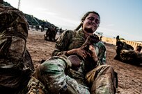U.S. Army Sgt. Liliana Munday, a Soldier with 218th Maneuver Enhancement Brigade, South Carolina National Guard, Combined Joint Task Force - Horn of Africa, practices grappling techniques with another Soldier as a part of combative training during the French Desert Commando Course Nov. 29, 2023, at the Centre Dentrainment Au Combat Djibouti. Participants who completed the training, hosted by the French 5th Overseas Interarms Regiment, received the prestigious desert commando badge.