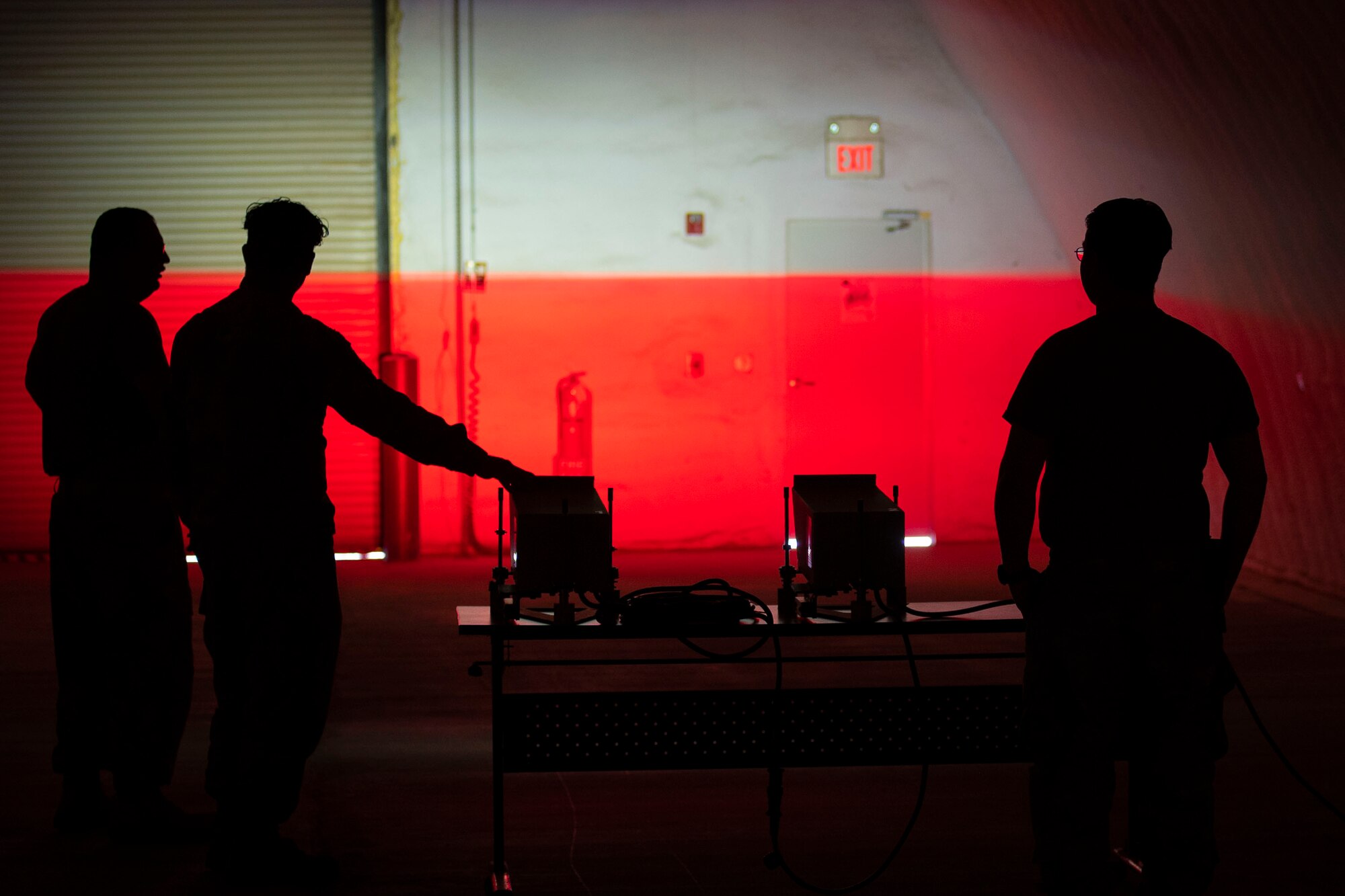 Airmen from the 635th Materiel Maintenance Squadron and the 1st Special Operations Civil Engineer Squadron test out the lighting for an Expeditionary Aircraft Lighting System during a training course at Holloman Air force Base, New Mexico, Dec. 14, 2023. The new EALS lighting system plays a key role in providing deployed environments with quick and reliable landing zones for a variety of aircraft. (U.S. Air Force photo by Airman 1st Class Isaiah Pedrazzini)