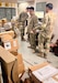 Soldiers of the 909th HR Co. (Postal) look over several Amazon packages and other mail just arriving into the Soto Cano Post Office mail room on Soto Cano Air Base near Comayagua, Honduras. The unit just kicked off a 9-month deployment providing postal operations at the air base.