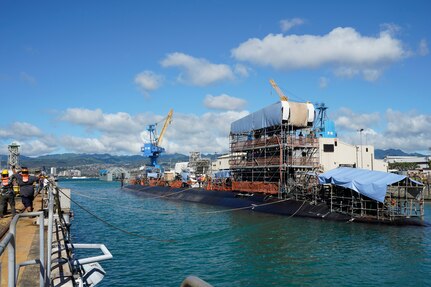 Pearl Harbor Naval Shipyard & Intermediate Maintenance Facility personnel assist in the undocking of the Virginia-class attack submarine USS Minnesota (SSN 783) from Dry Dock 2, Oct. 12, 2023.