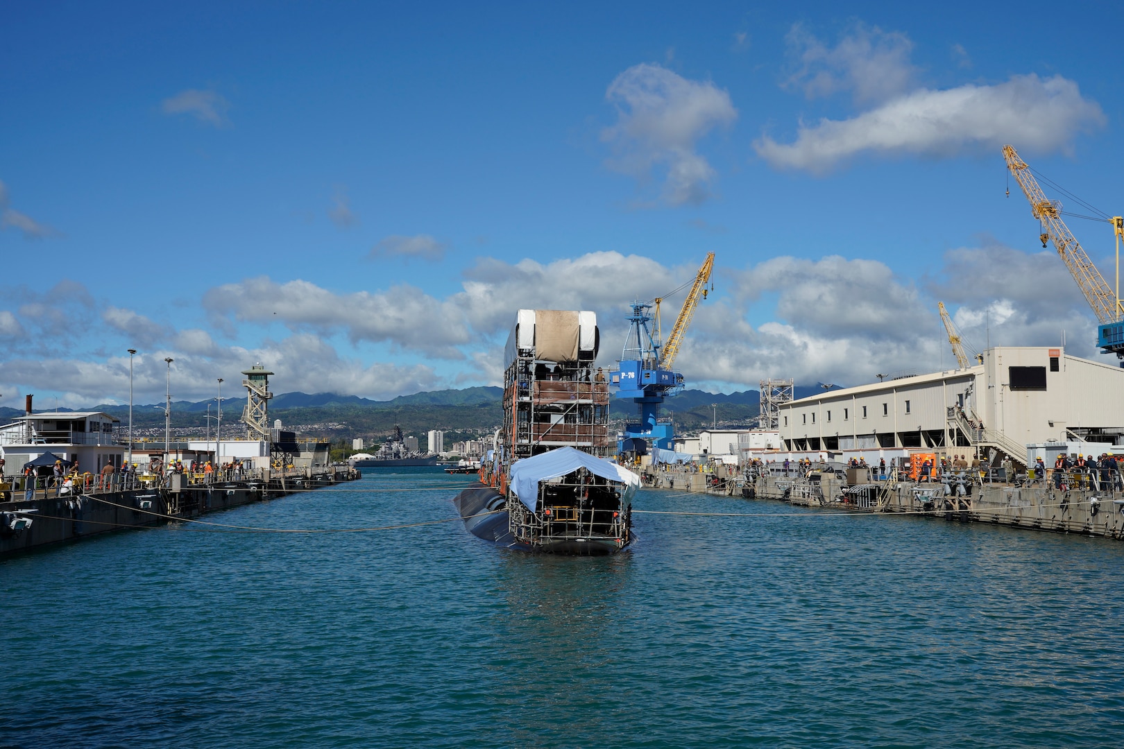 Pearl Harbor Naval Shipyard & Intermediate Maintenance Facility personnel undock the Virginia-class attack submarine USS Minnesota (SSN 783) from Dry Dock 2, Oct. 12, 2023.