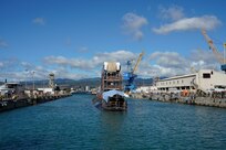 Pearl Harbor Naval Shipyard & Intermediate Maintenance Facility personnel undock the Virginia-class attack submarine USS Minnesota (SSN 783) from Dry Dock 2, Oct. 12, 2023.