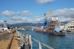 Pearl Harbor Naval Shipyard & Intermediate Maintenance Facility personnel assist in the undocking of the Virginia-class attack submarine USS Minnesota (SSN 783) from Dry Dock 2, Oct. 12, 2023.