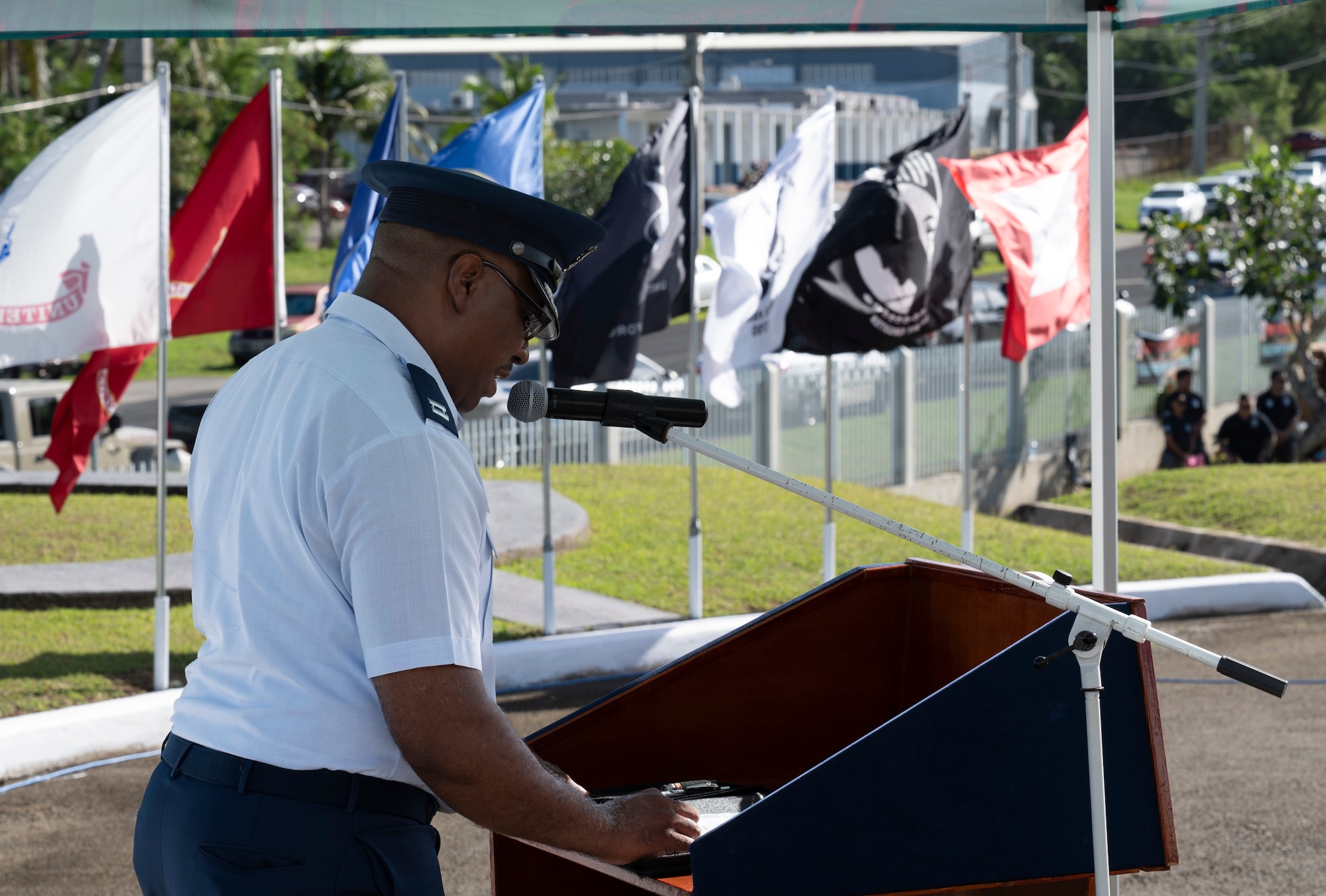 U.S. Air Force Capt. Timmie Henson, 36th Wing chaplain, speaks during the Wreaths Across America ceremony at the Guam Veterans Cemetery, Guam, Dec. 16, 2023. The Wreaths Across America program allows families to honor and remember the sacrifices of our military Veterans by placing wreaths on their graves during the holiday season. (U.S. Air Force photo by Airman 1st Class Spencer Perkins)