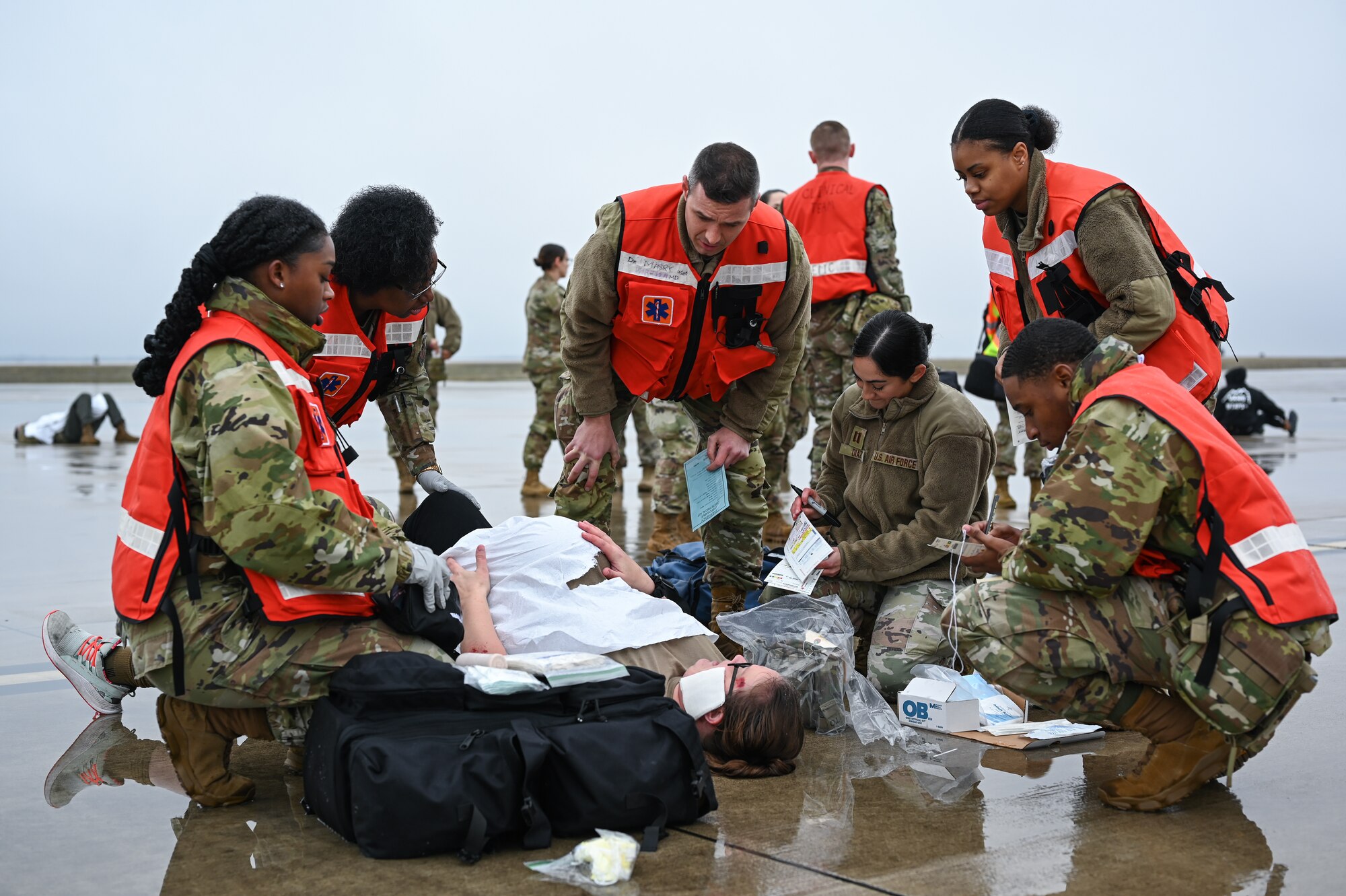 U.S. Air Force Airmen from the 47th Medical Group treat a simulated pregnant woman during a Major Accident Response Exercise (MARE) on the flight line at Laughlin Air Force Base, Texas, Dec. 14, 2023.