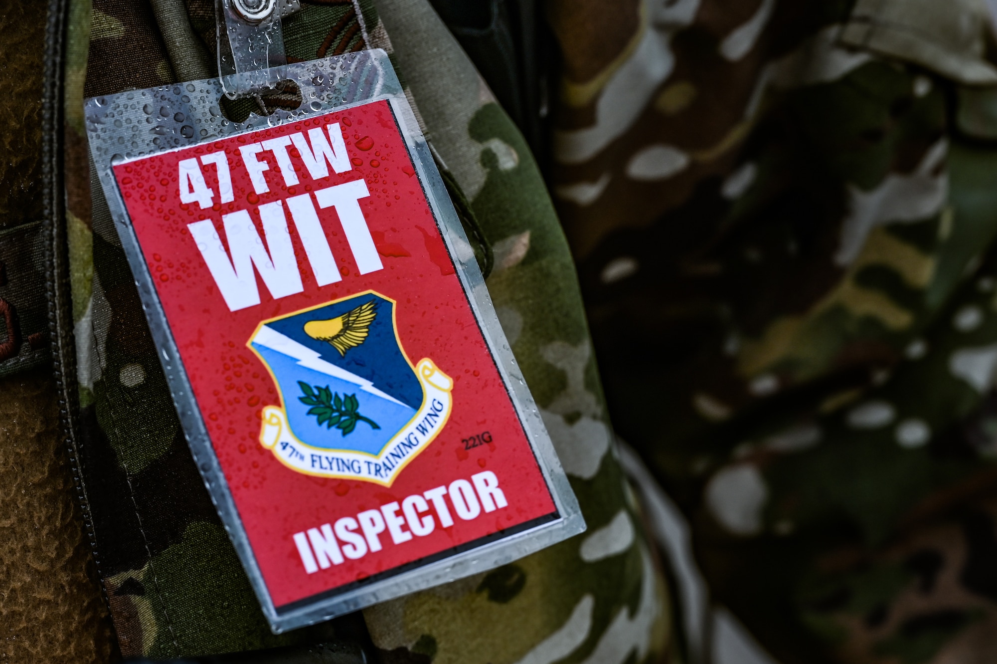 A close up of a U.S. Air Force wing inspection team member’s badge is worn during a Major Accident Response Exercise (MARE) on the flight line at Laughlin Air Force Base, Texas, Dec. 14, 2023.