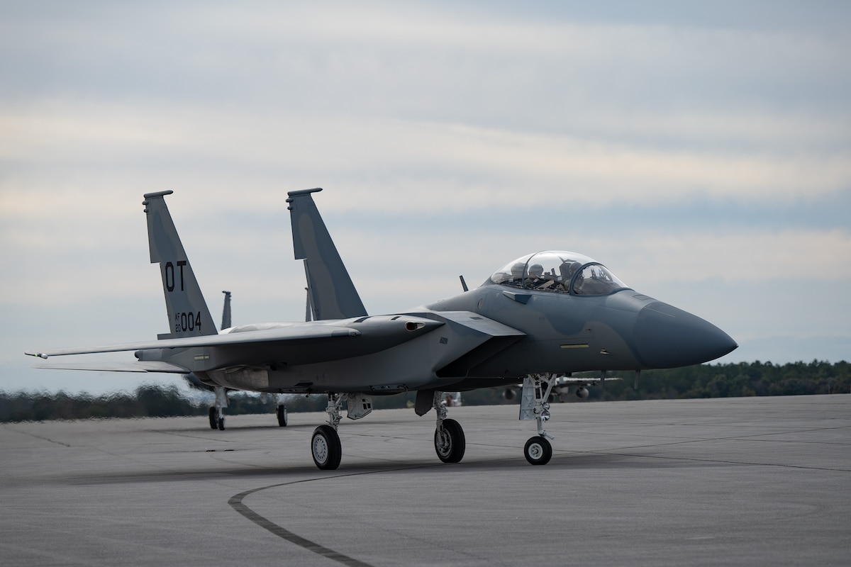 A F-15EX rests on the flight line.