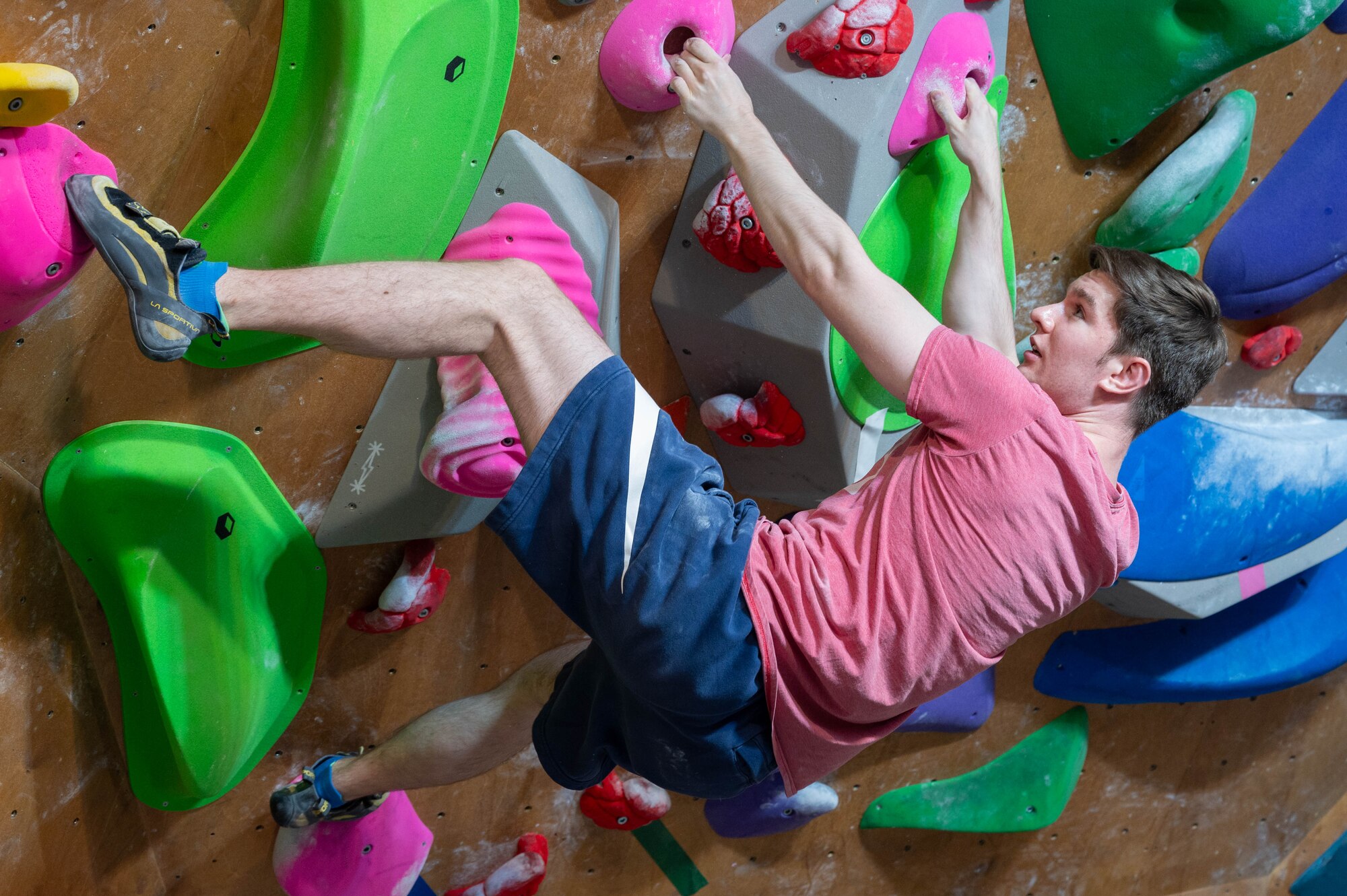 U.S. Air Force Senior Airman Bryce Reash, 51st Fighter Wing finance technician, climbs a bouldering wall during a resilience building event at the Mountain Ground rock climbing gym in Dongtan-Daero, Republic of Korea, Dec. 15, 2023. The chapel conducted surveys before and after the event to determine how to better care for the Airmen on base and tend to their needs in the future. (U.S. Air Force photo by Airman 1st Class Chase Verzaal)