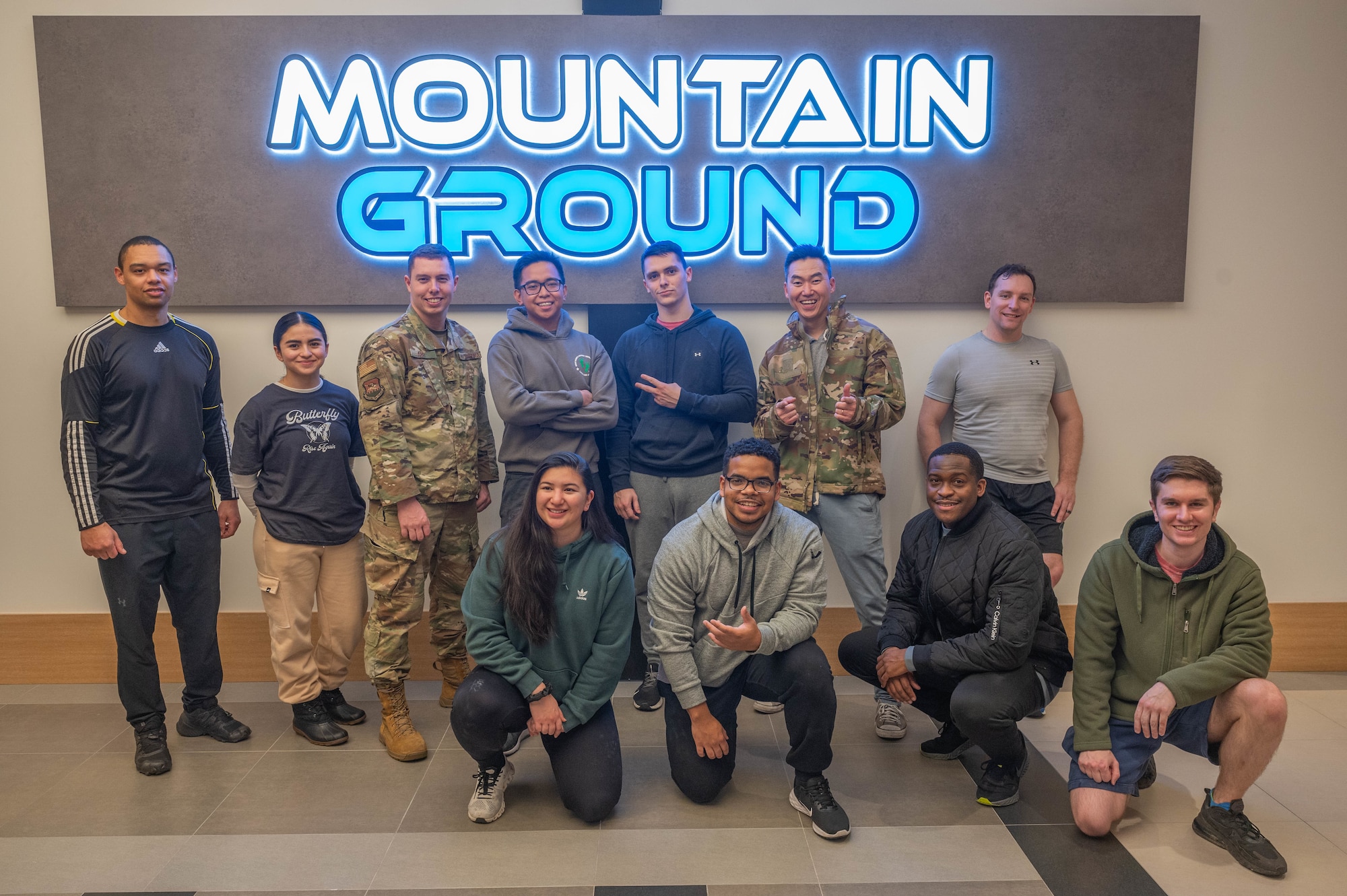 U.S. Air Force Airmen from the 51st Fighter Wing pose for a group photo after a resilience building event at the Mountain Ground rock climbing gym in Dongtan-Daero, Republic of Korea, Dec. 15, 2023. The event served as a facilitator for discussion on how to become more resilient, and how Airmen could build a support system to help them as they set goals and develop professionally. (U.S. Air Force photo by Airman 1st Class Chase Verzaal)
