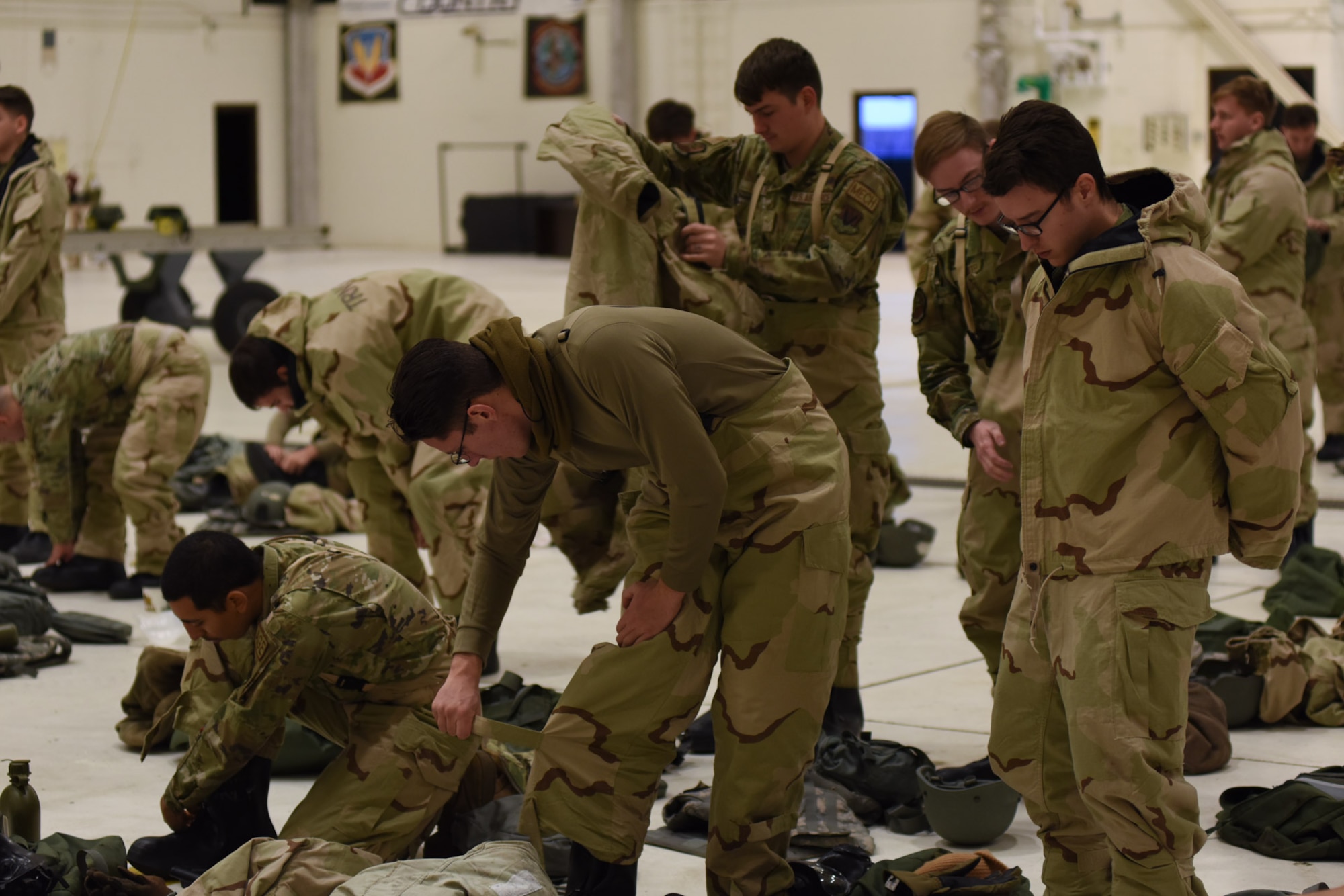 Airmen take the CBRN training course.