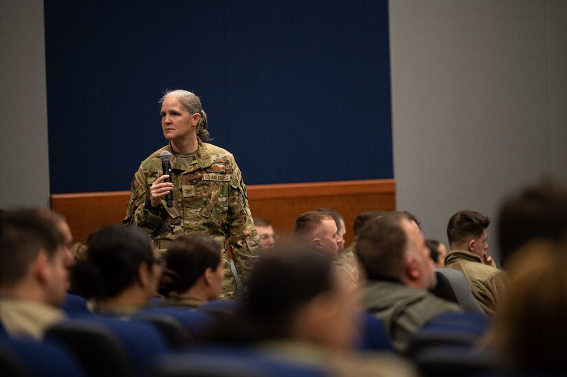 U.S. Air Force Col. Elizabeth Hanson, 305th Air Mobility Wing commander, hosts a commander’s call for members of the 305th AMW at Joint Base McGuire-Dix-Lakehurst, N.J., Dec. 20, 2023. The event featured informational discussions about Air Force Force Generation concepts, mental health resources and an end-of-year- wrap-up. (U.S. Air Force photo by Senior Airman Sergio Avalos)