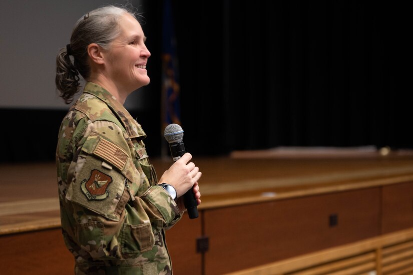 U.S. Air Force Col. Elizabeth Hanson, 305th Air Mobility Wing commander, hosts a commander’s call for members of the 305th AMW at Joint Base McGuire-Dix-Lakehurst, N.J., Dec. 20, 2023. The event featured informational discussions about Air Force Force Generation concepts, mental health resources and an end-of-year- wrap-up. (U.S. Air Force photo by Airman 1st Class Aidan Thompson)