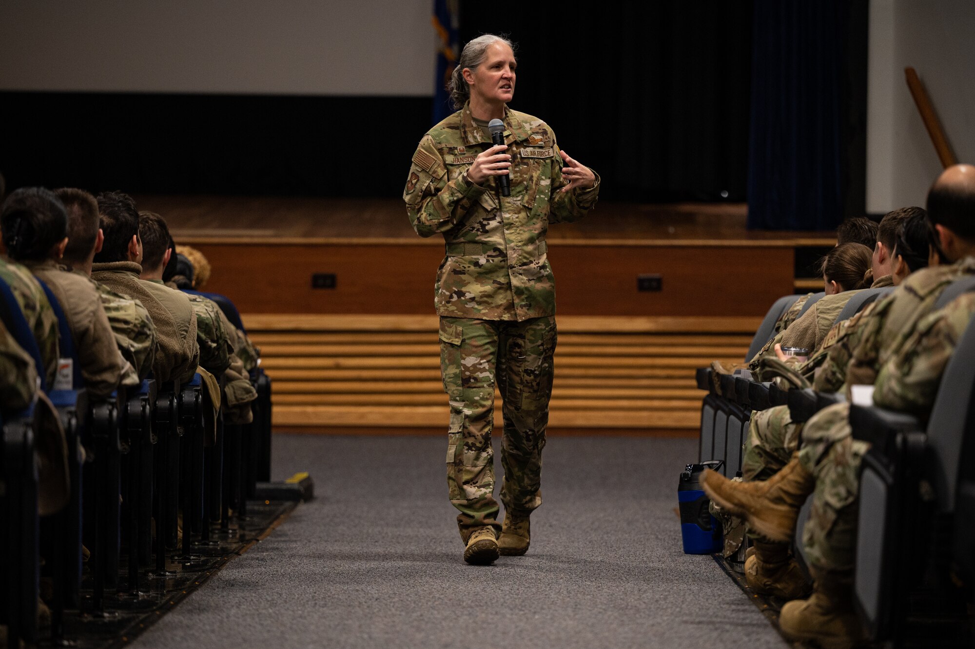 U.S. Air Force Col. Elizabeth Hanson, 305th Air Mobility Wing commander, hosts a commander’s call for members of the 305th AMW at Joint Base McGuire-Dix-Lakehurst, N.J., Dec. 20, 2023.