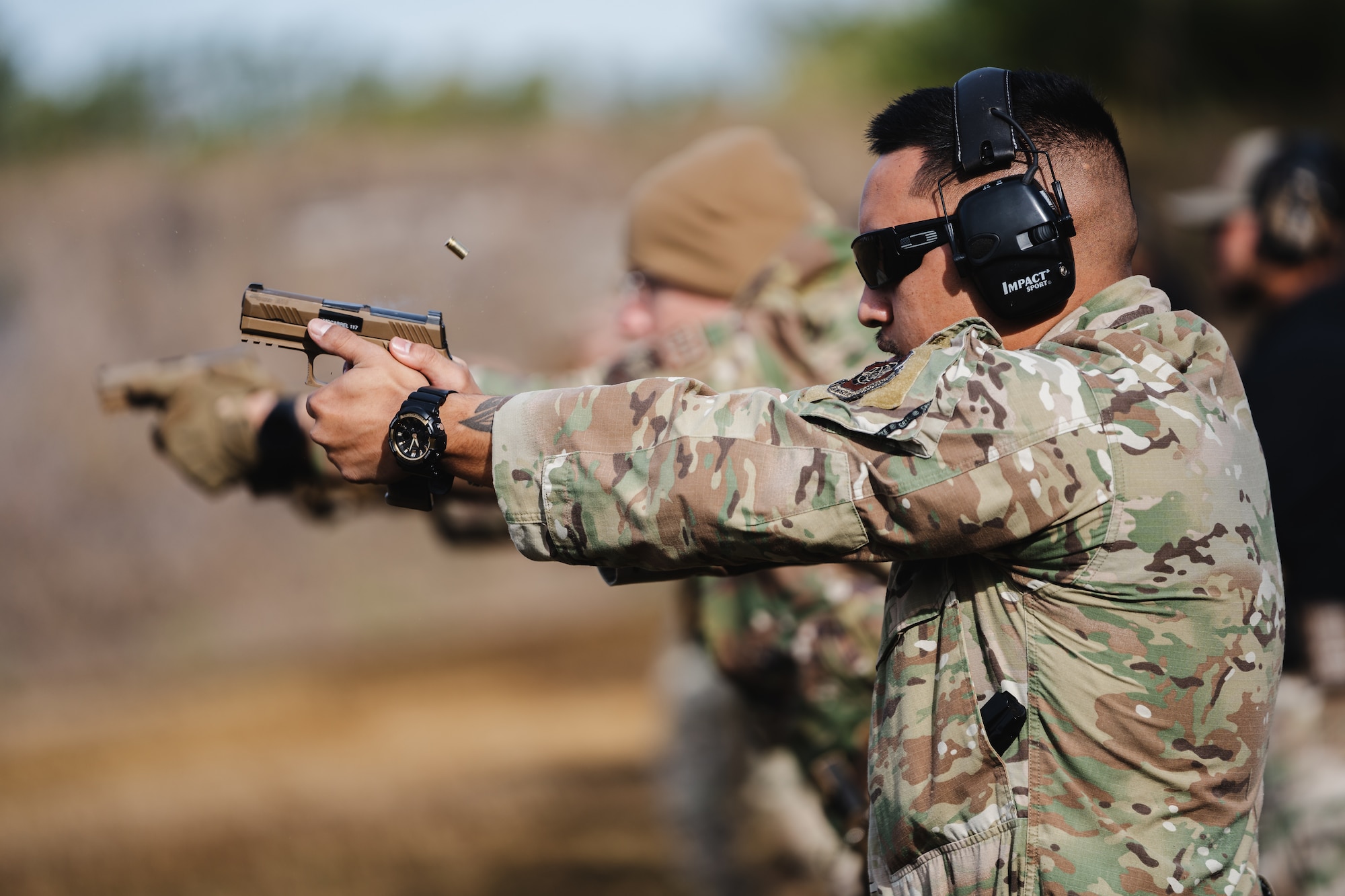 U.S. Air Force Staff Sgt. Joe McCarrel, 6th Security Forces Squadron defender, fires his weapon at the combat arms training and maintenance facility at MacDill Air Force Base, Florida, Dec. 12, 2023.