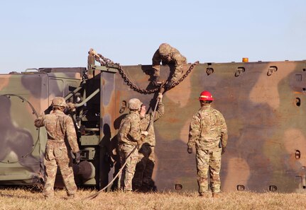 Instructors ensure safety protocols are being utilized while soldiers conduct overturned vehicle operations. Regional training Site Maintenance – Fort Indiantown Gap, under the 94th Training Division, partnered with the 1st Brigade Combat Team 10th Mountain Division in Fort Drum, NY, to ensure 16 active-duty soldiers received the wheeled recovery specialist additional skill identifier.