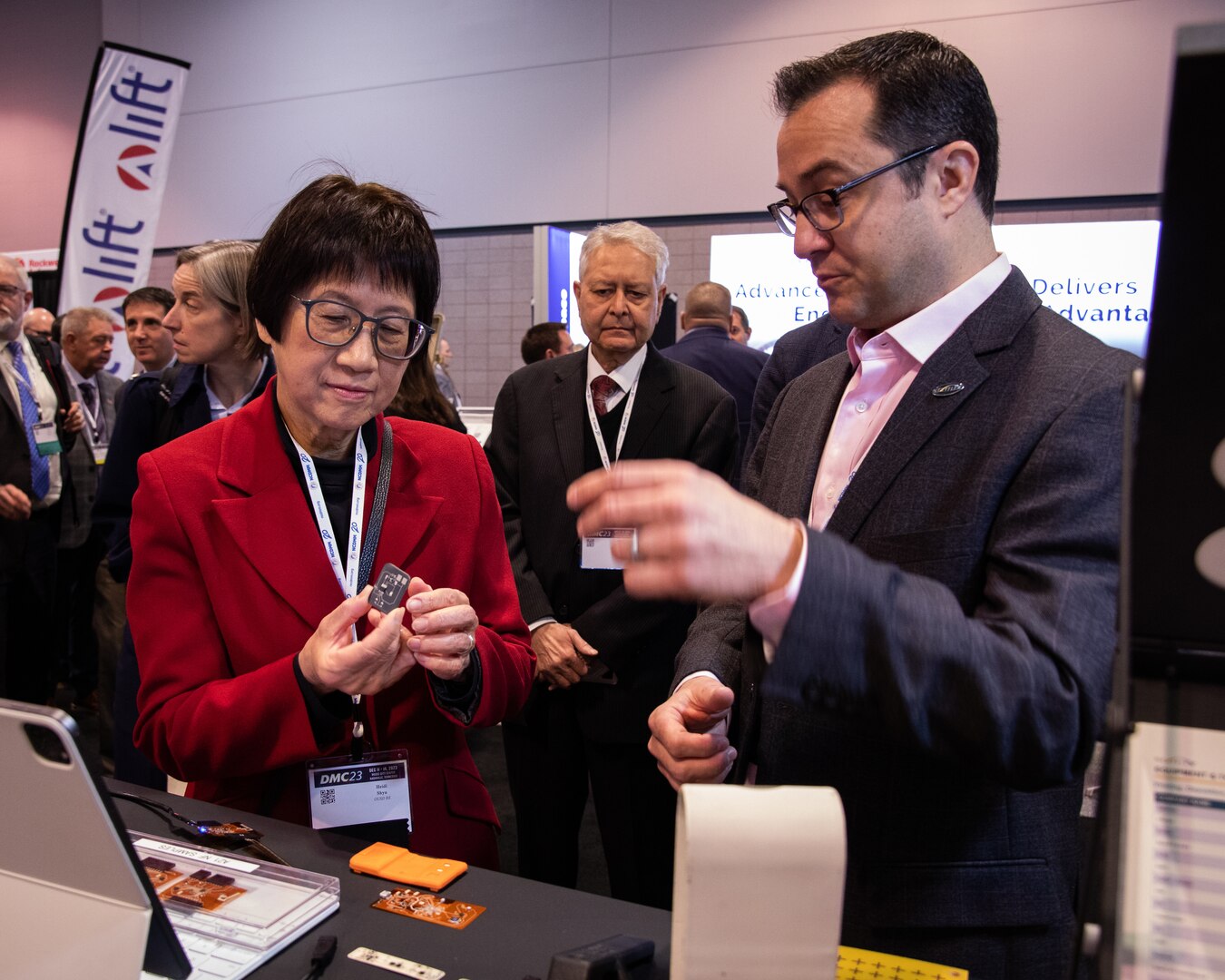 Heidi Shyu, Under Secretary of Defense for Research and Engineering (OUSD(R&E)) visits NextFlex at the Defense Manufacturing Conference to view new developments in hybrid electronics with Dr. Scott Miller, Director of Technology.