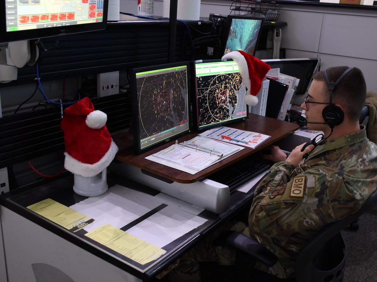 Airman 1st Class Kyle Larsen, a member of the New York Air National Guard assigned to the Eastern Air Defense Sector in Rome, New York, keeps an eye on the sky over the eastern United States while preparing for Christmas Eve, when the sector’s Airmen will help in the annual NORAD Tracks Santa effort.