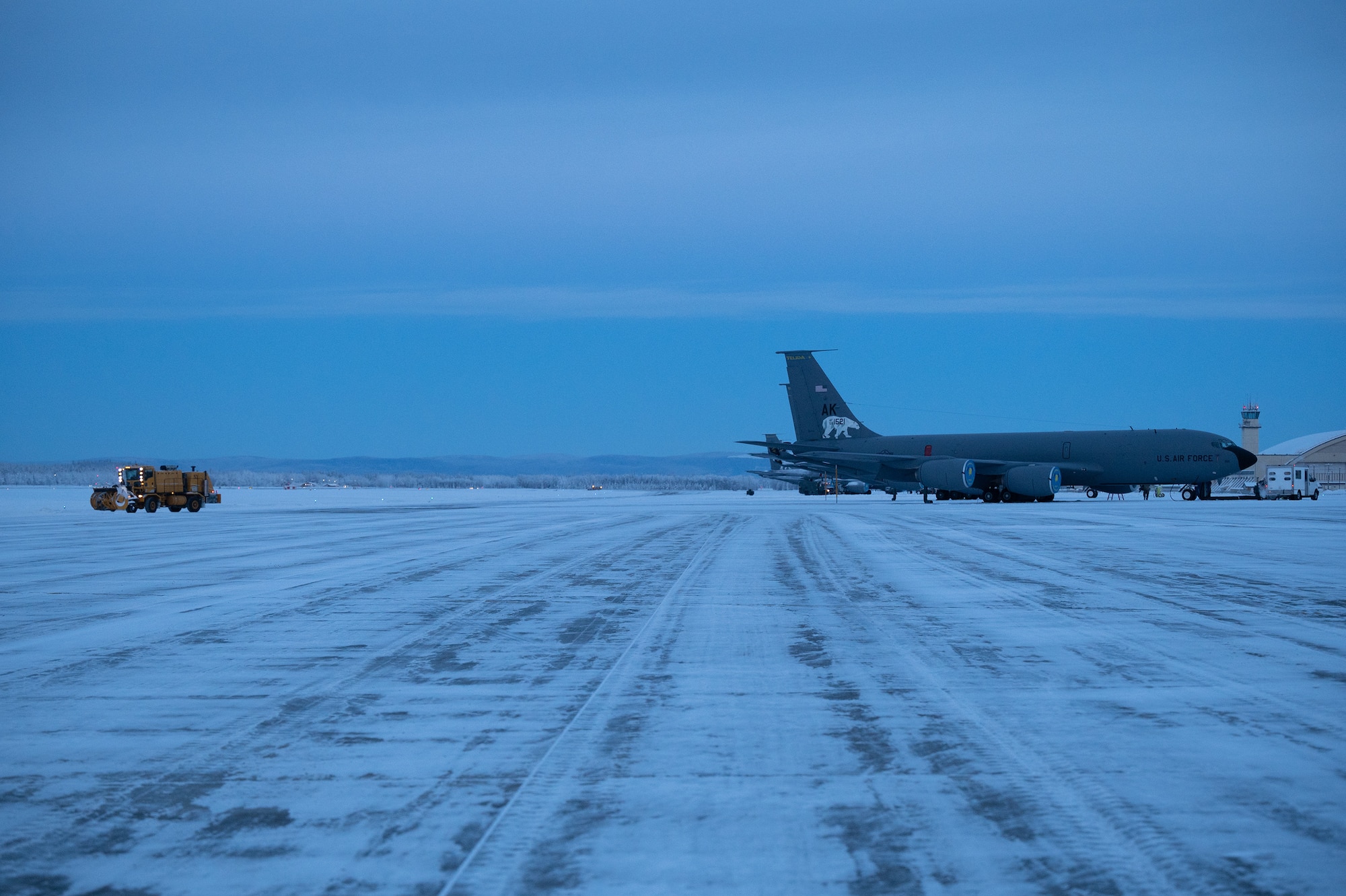 A 354th Civil Engineering Squadron snowplow operator prepares to blow snow off the flight line on Eielson Air Force Base Alaska, Dec. 19, 2023. The snowplow operators run 24/7 shifts to ensure the flight line is clear for aircraft to travel anywhere in the Northern Hemisphere. (U.S. Air Force photo by Airman Spencer Hanson)
