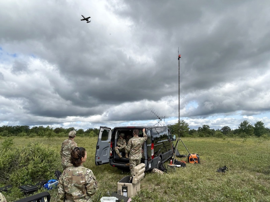 Members of the Wisconsin Air National Guard’s 128th Air Control Squadron explored managing air traffic with off-the-shelf equipment from the back of a government passenger van July 18 at a forward operating location at Camp Grayling Joint Maneuver Training Center, Mich. This was part of a two-week expeditionary training to improve the unit’s overall readiness for a potential near-peer conflict. Wisconsin National Guard photo