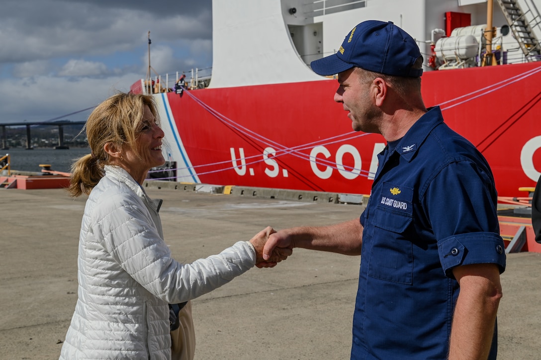 Caroline Kennedy, U.S. Ambassador for Australia, and U.S. Coast Guard Capt. Keith Ropella, commanding officer, shake hands after a tour of the U.S. Coast Guard Cutter Polar Star (WAGB 10) in Hobart, Australia, Dec. 16, 2023. Operation Deep Freeze is one of many operations in the Indo-Pacific in which the U.S. military promotes security and stability across the region. (U.S. Coast Guard photo by Petty Officer 3rd Class Ryan Graves)