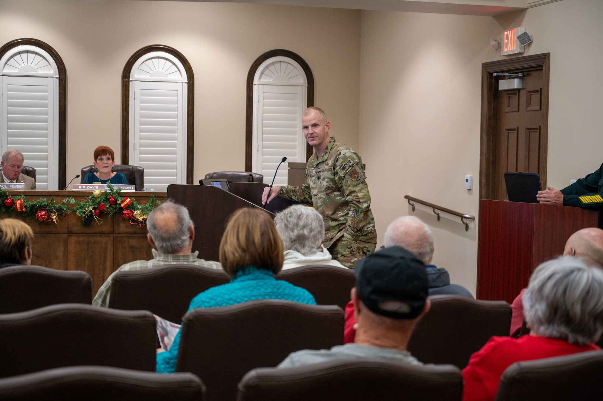 U.S. Airmen from the 114th Electromagnetic Warfare Squadron are pictured with the city of Cape Canaveral Mayor Wes Morrison during a city council meeting held Dec. 19, 2023. The mayor declared Jan. 14, 2024 as '114th EWS Day' in honor of the contributions made by its members, their continued involvement in the community, and their commitment to protecting and defending the values and interests of local residents, and all U.S. citizens. The 114th EWS is a geographically-separated unit of the Florida Air National Guard's 125th Fighter Squadron located at Cape Canaveral Space Force Station. Their mission is to organize, train and equip personnel to conduct electromagnetic attacks in contested, congested and constrained environments downrange, using specialized equipment such as the counter communications system. Previously, the unit operated as the 114th Space Control Squadron before it was redesignated as an electromagnetic squadron in January 2023. (U.S. Air National Guard photo by Tech Sgt. Chelsea Smith)