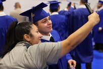 Cadets graduate from the Washington Youth ChalleNGe Academy in a ceremony at Tacoma Community College Dec. 15, 2023. The WYCA is a disciplined, quasi-military academy to empower at-risk youth to improve their education levels and employment potential and become responsible members of society.
