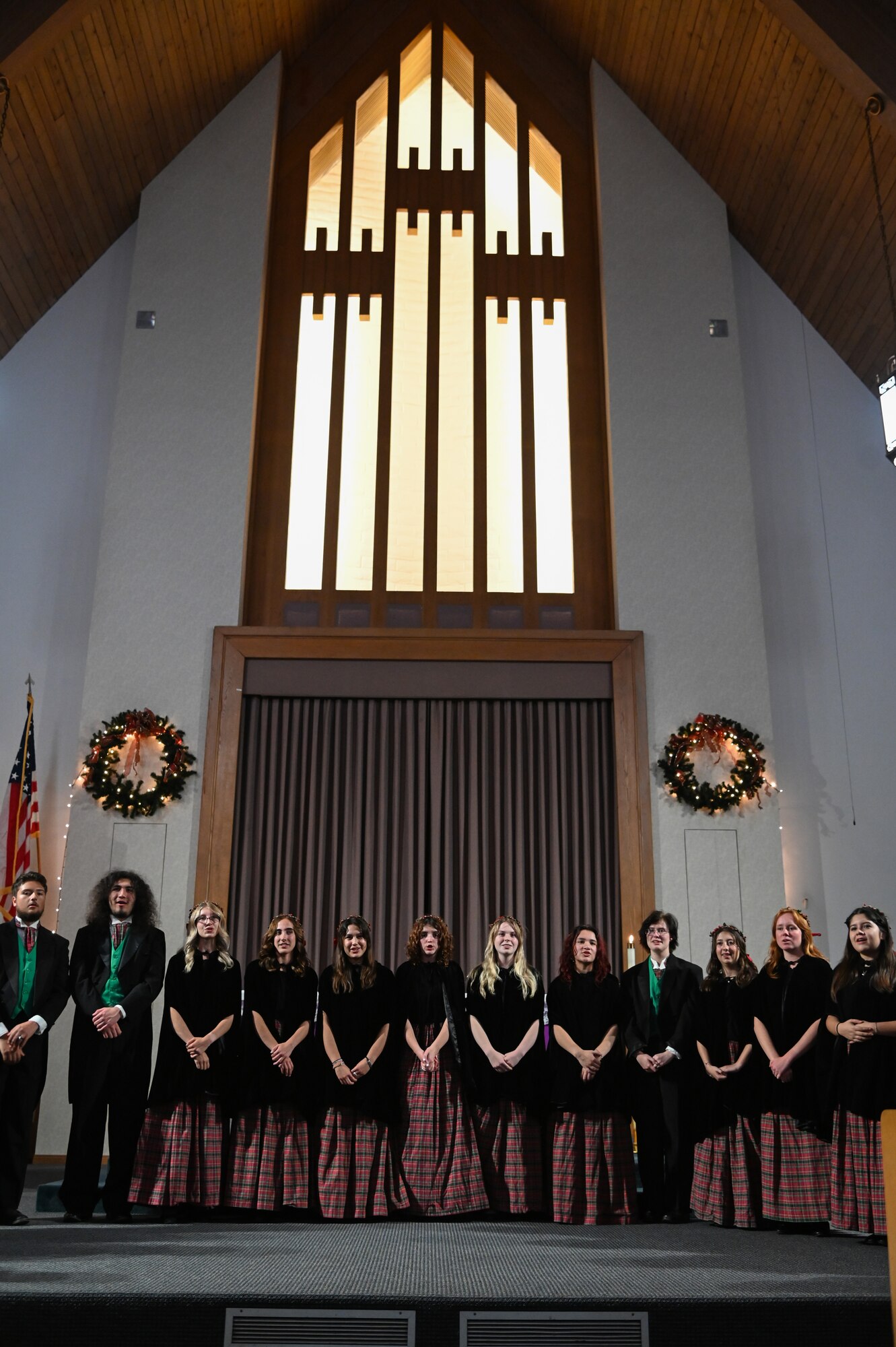 madrigals perform christmas songs at base chapel