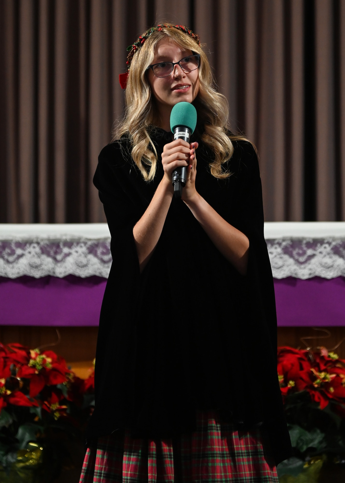 madrigals perform christmas songs at base chapel