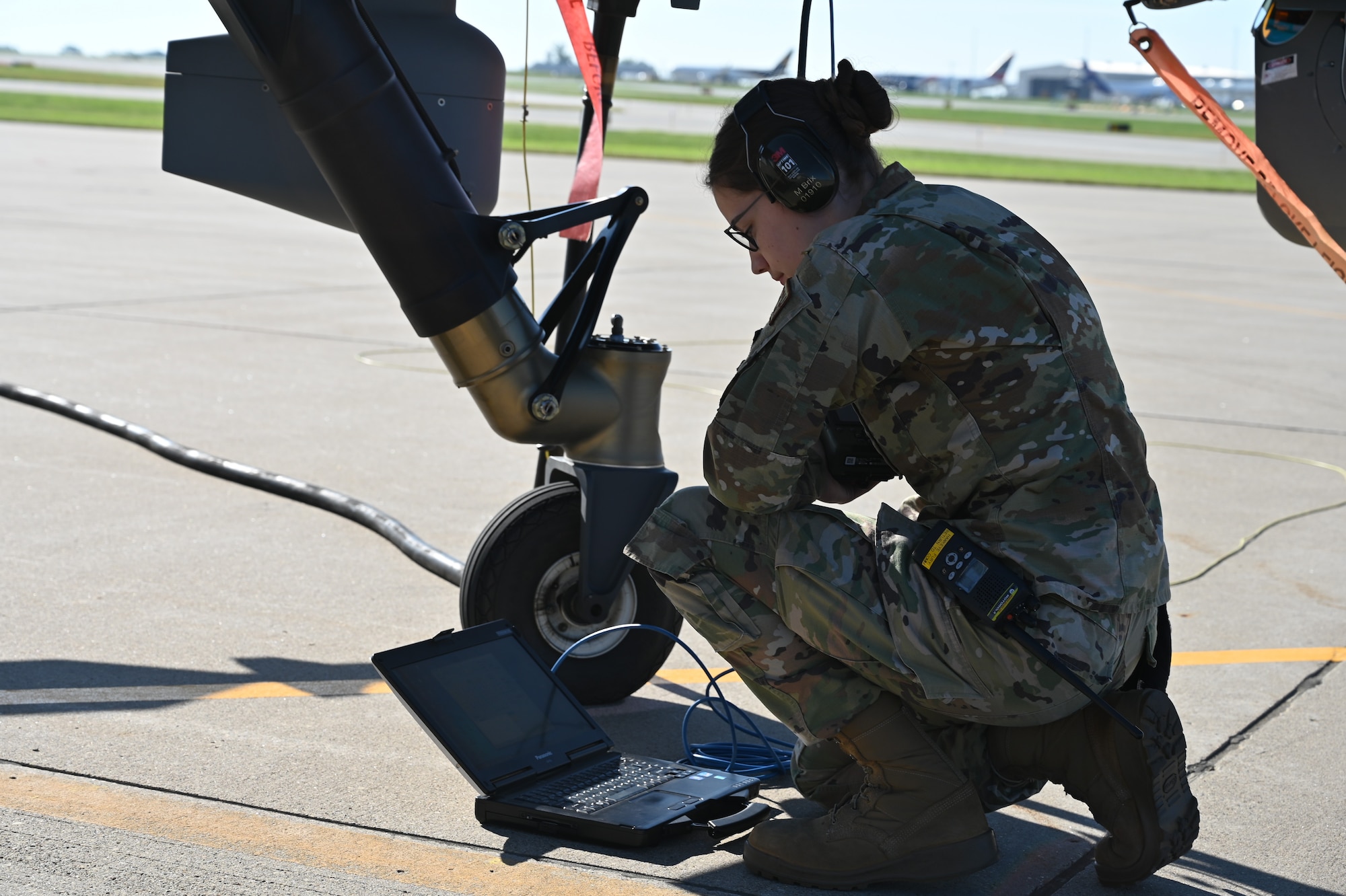 SSgt Mikyla Brix prepares to launch an MQ-9 Reaper for the 119th Maintenance Squadron.